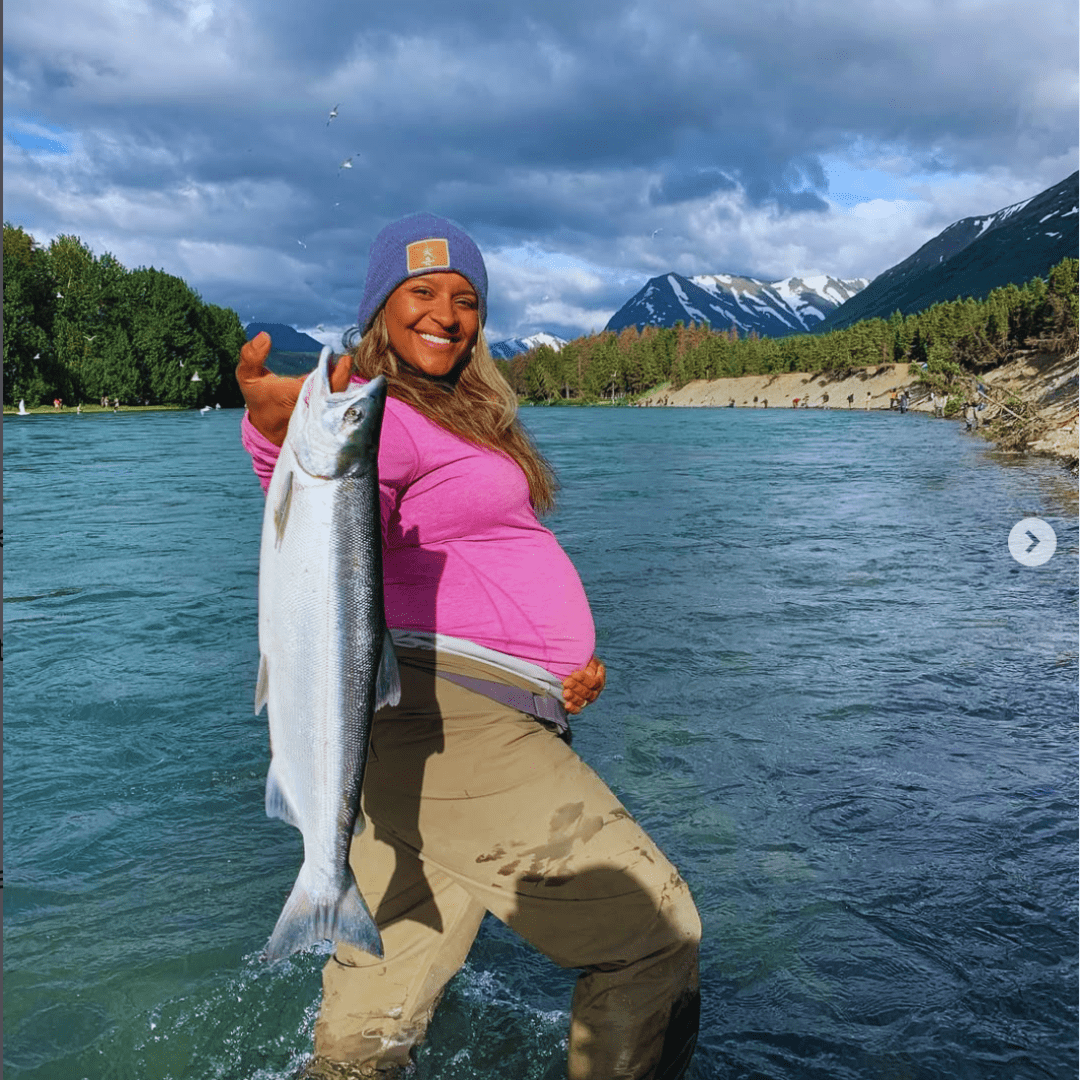 Natasha Sherrill holding a fish in Anchorage Alaska