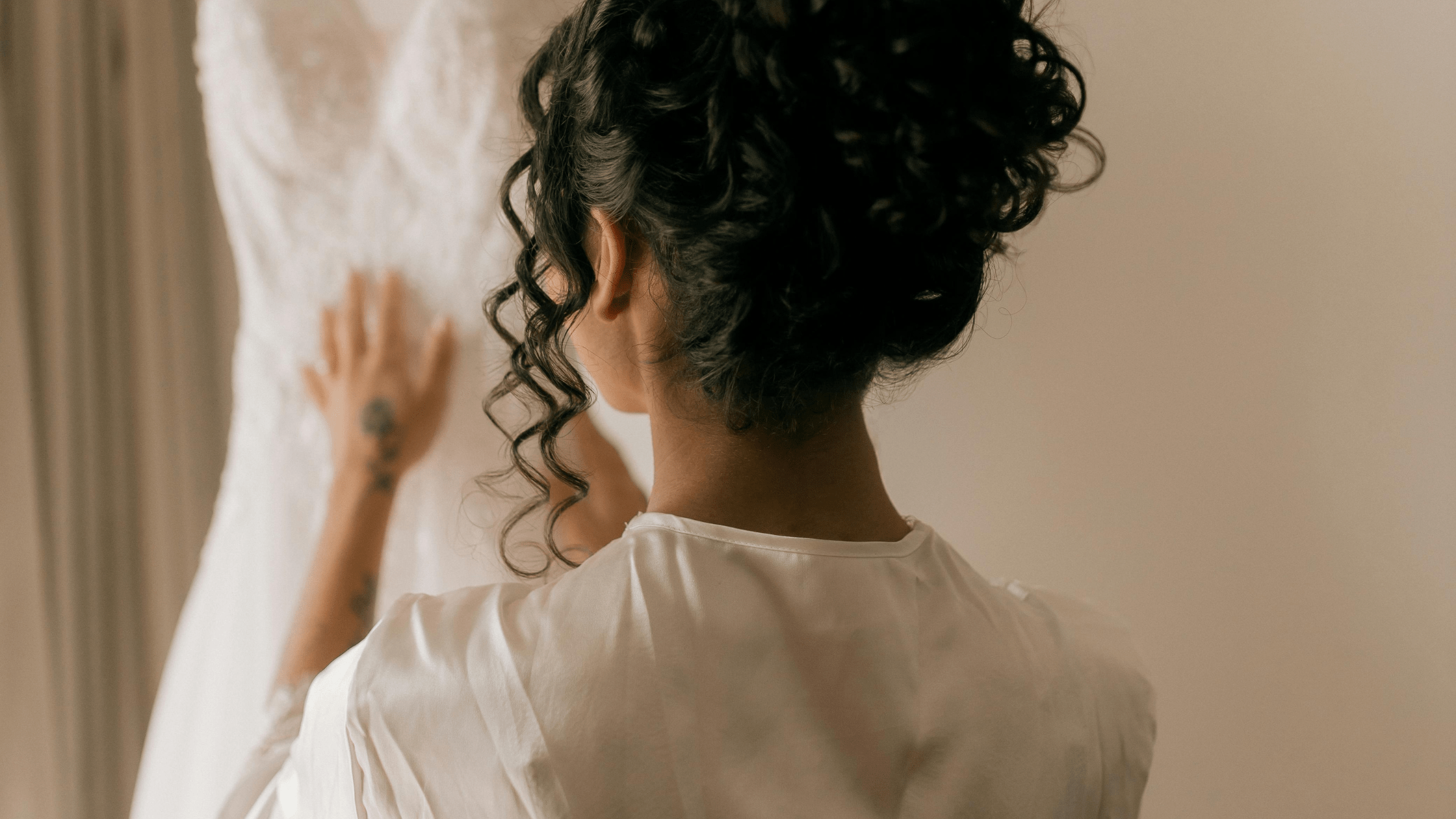 Bride from behind showing hair and veil — wedding ready skin Anchorage