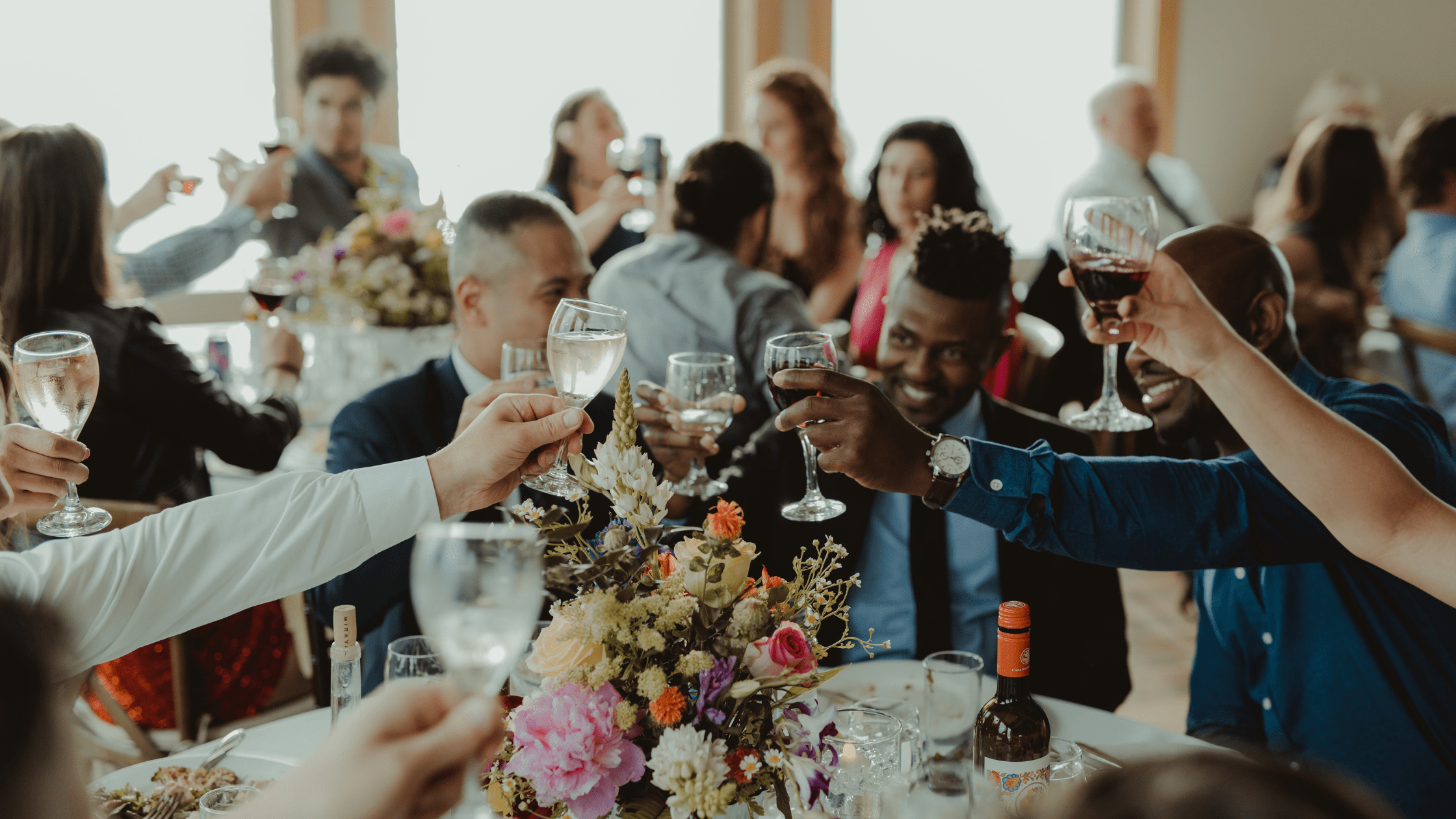 Natasha Sherrill toasting at her Alaska wedding — New Age Medspa Anchorage