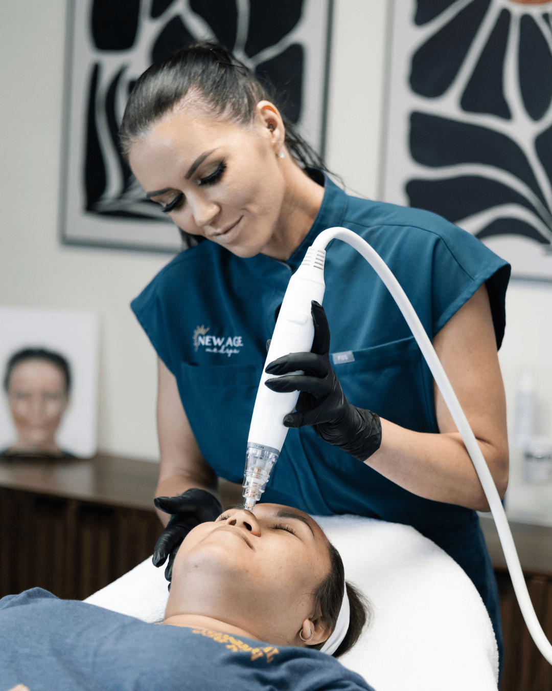 Amy Kondi performing a treatment on a client at New Age Medspa Anchorage