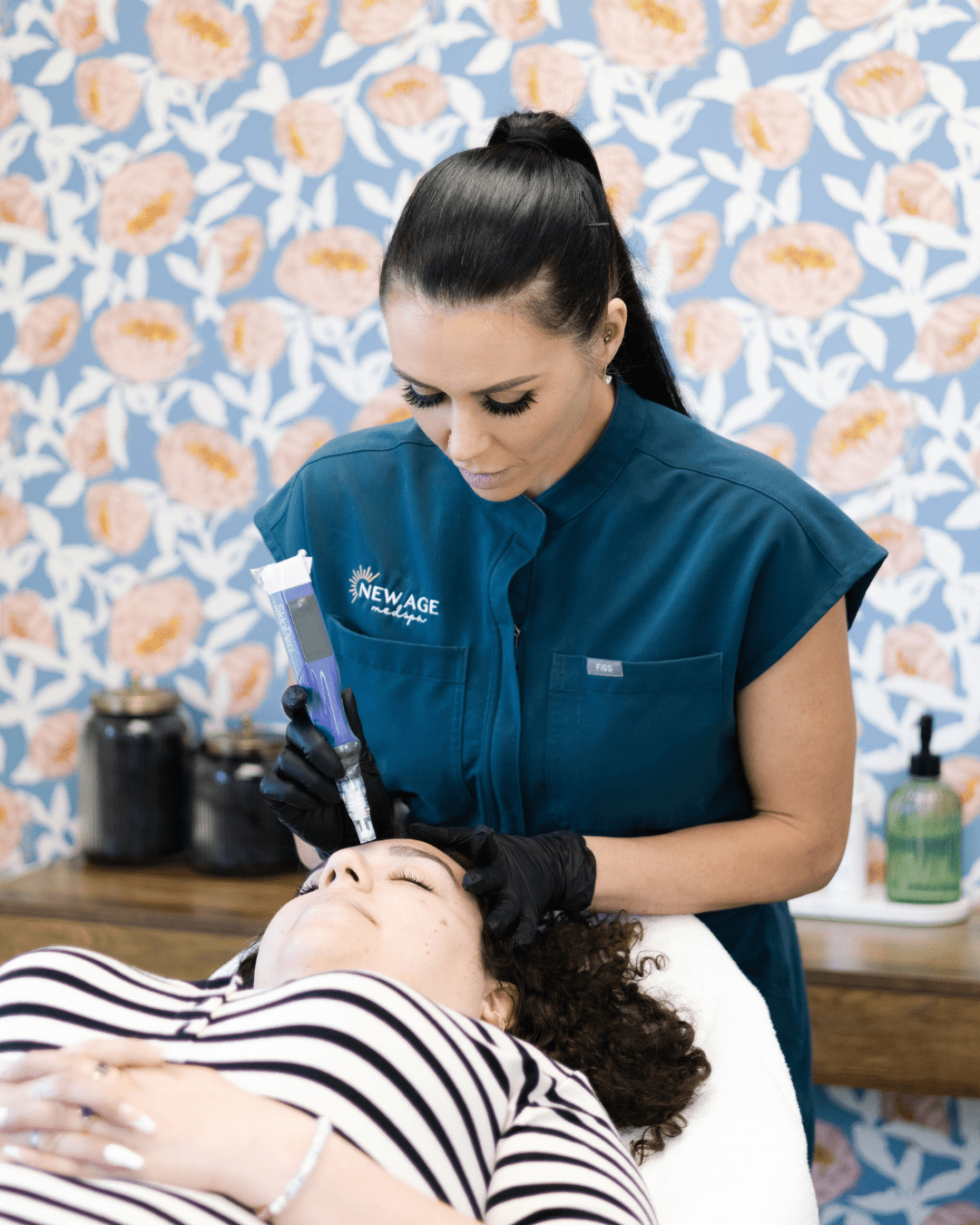 Amy Kondi performing a SkinPen microneedling treatment at New Age Medspa