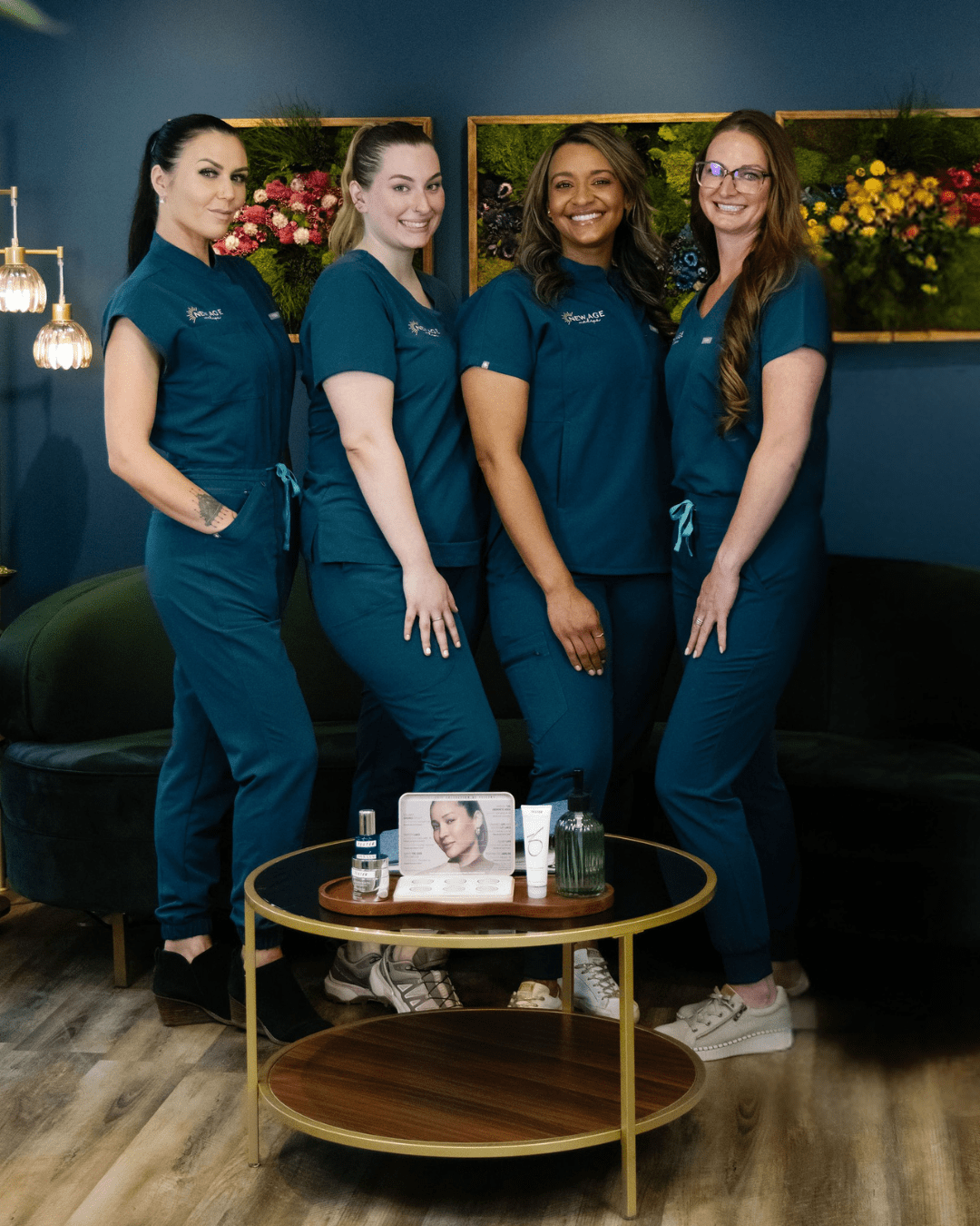 The New Age Medspa team — Natasha Sherrill, Brie Freckleton, Amy Kondi, Patricia Quepons, and Kassidy O'Connell — in their Anchorage clinic