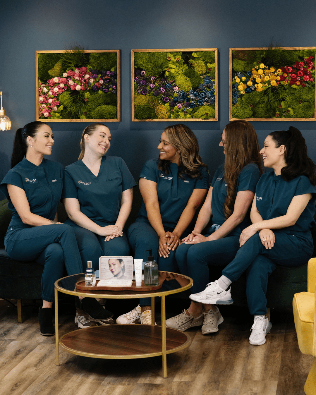 The New Age Medspa team — Natasha Sherrill, Brie Freckleton, Amy Kondi, Patricia Quepons, and Kassidy O'Connell — in their Anchorage clinic