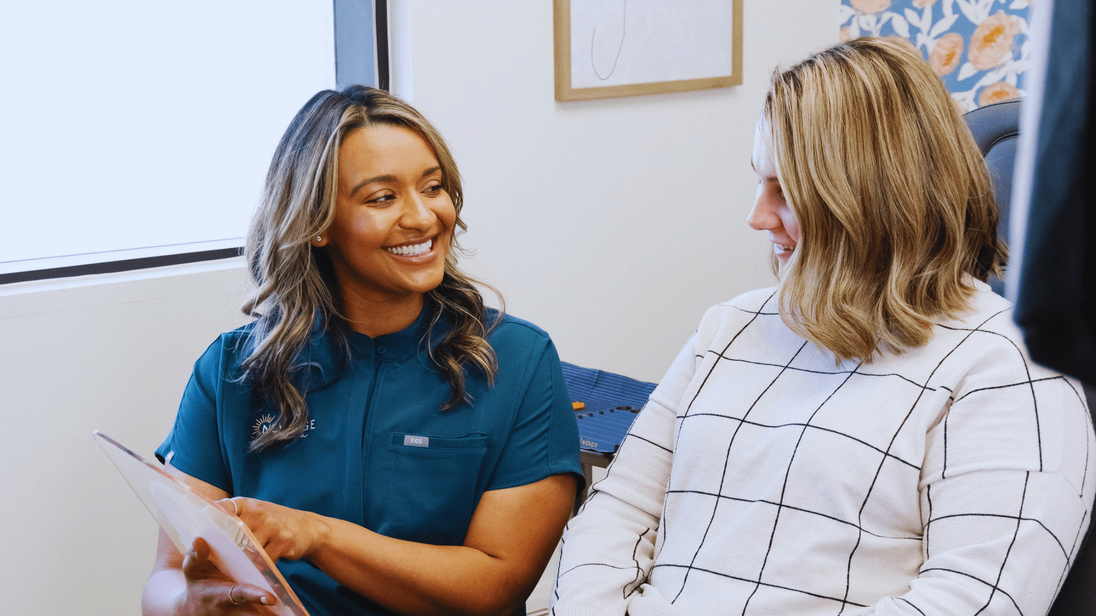 Natasha Sherrill, FNP-C, consulting with a client at New Age Medspa in Anchorage
